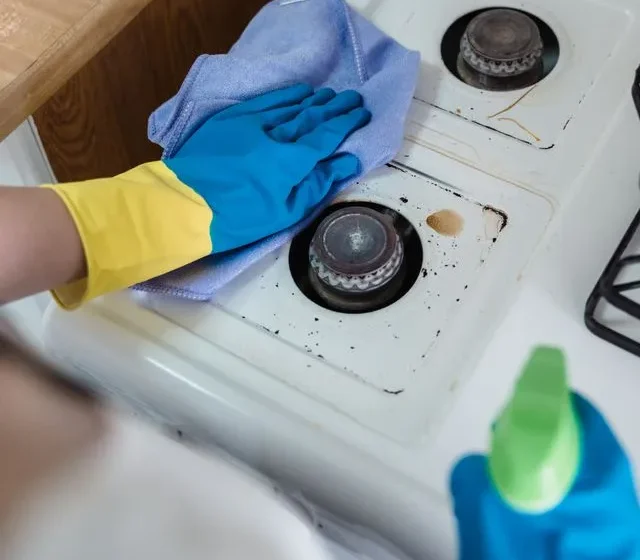 Deep cleaning a kitchen as part of a professional home cleaning service